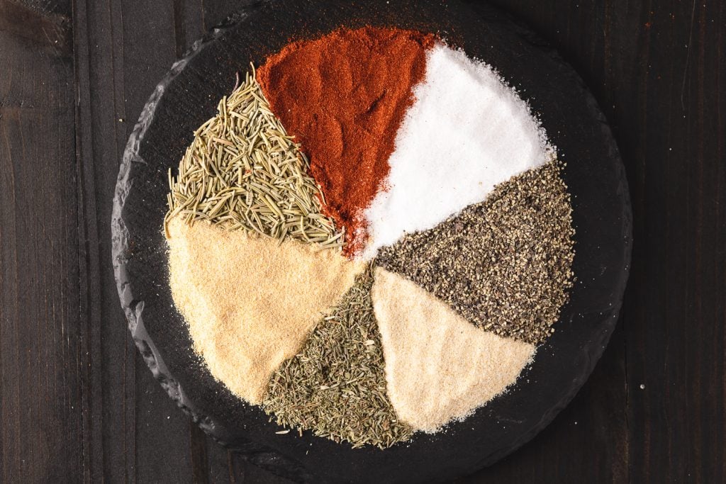 Ingredients for the best steak seasoning in a bowl.